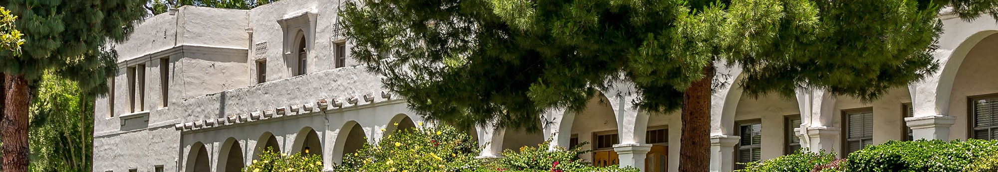 arches at Nazareth school with greenery all around