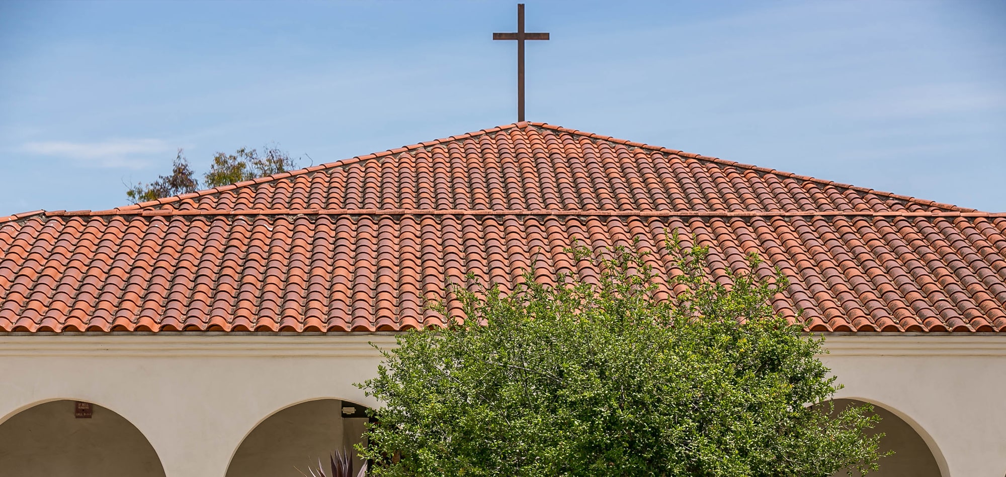 roof of Nazareth School with cross on top