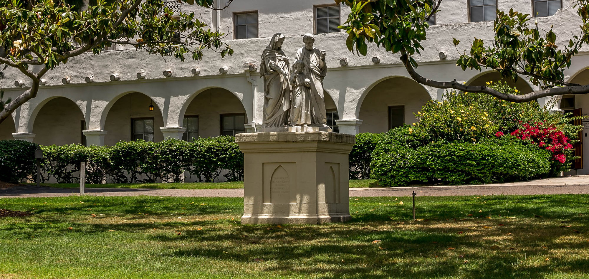 front view of Nazareth School of San Diego with religious statue in front