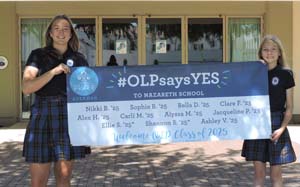 Ellie and Shannon with their banner