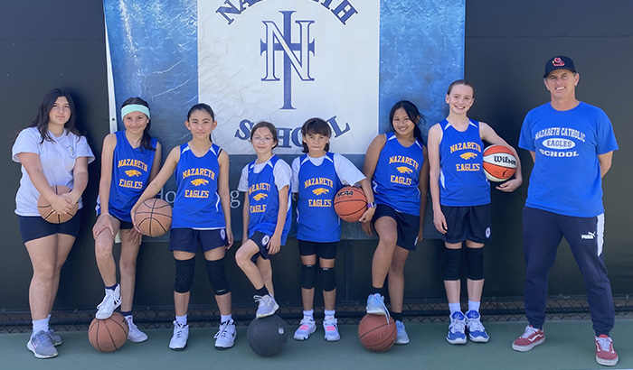 Nazareth Eagles girls basketball team 2 in blue shirts