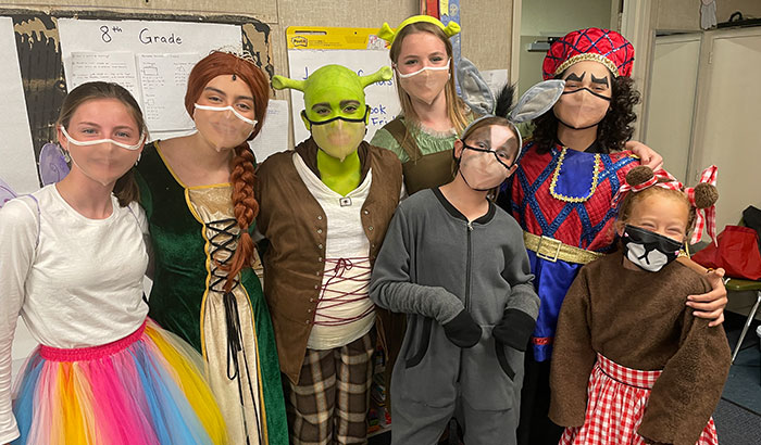 Main Shrek the Musical cast posing together