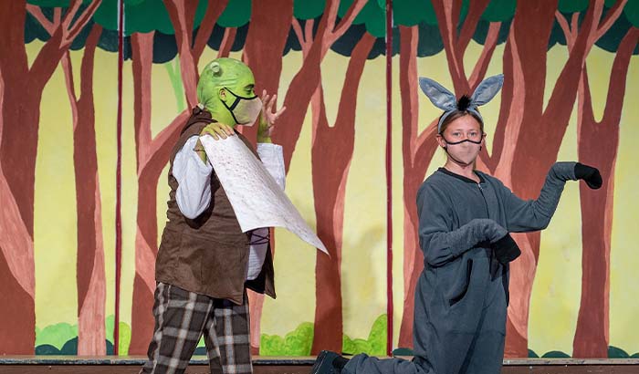 Students dressed as Shrek and Donkey